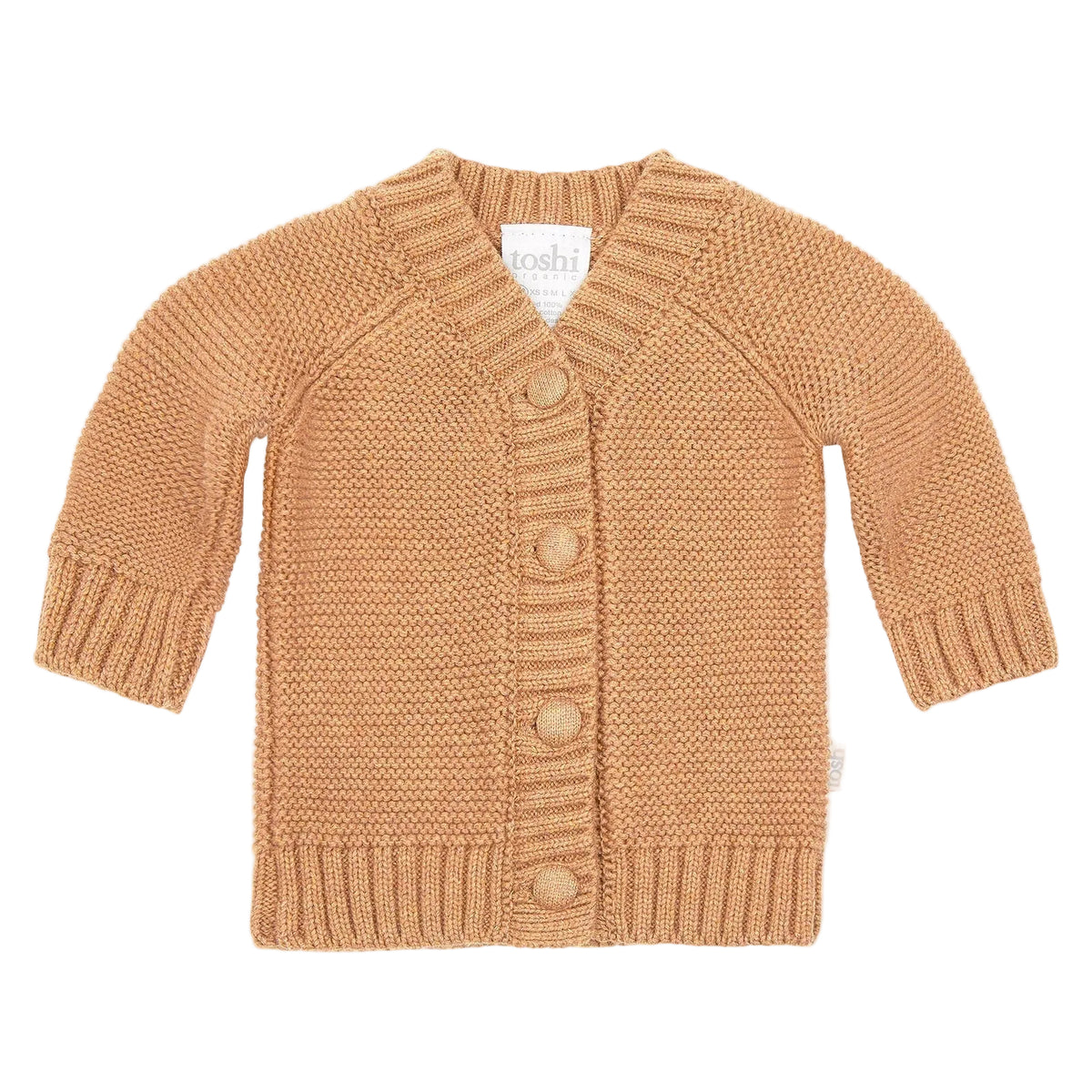 Knitted baby cardigan with buttons on a light beige background