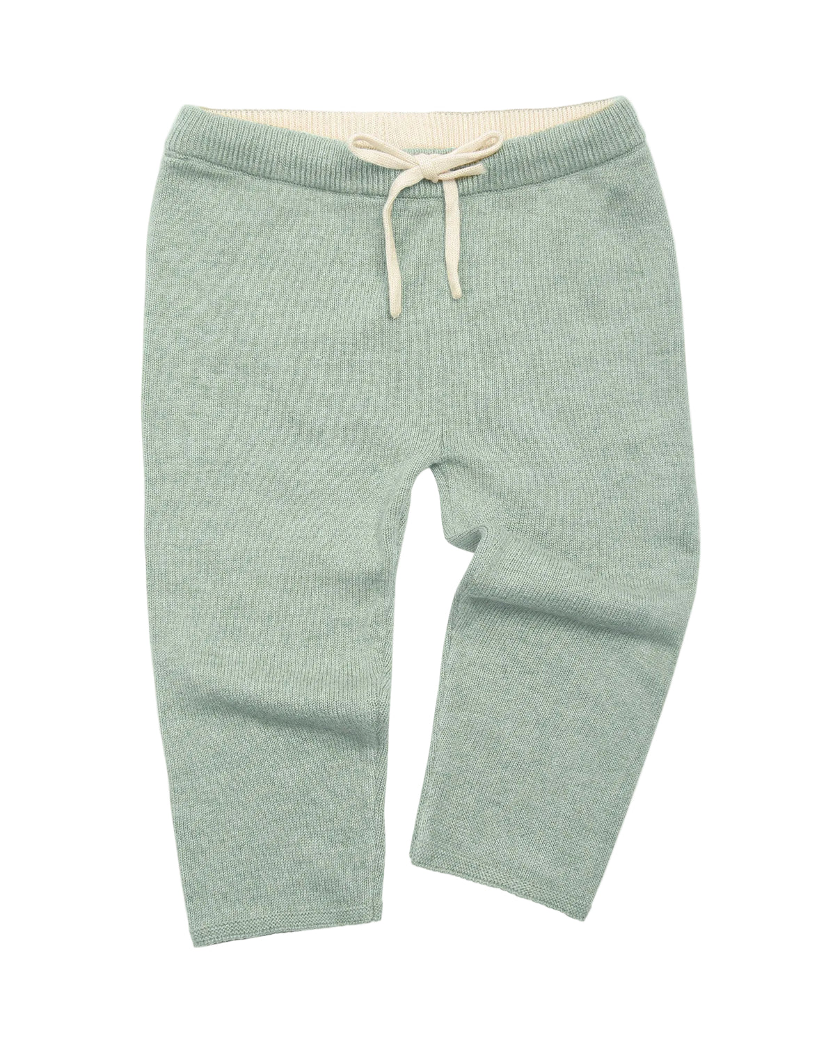Green knitted pants with a drawstring on a light gray background