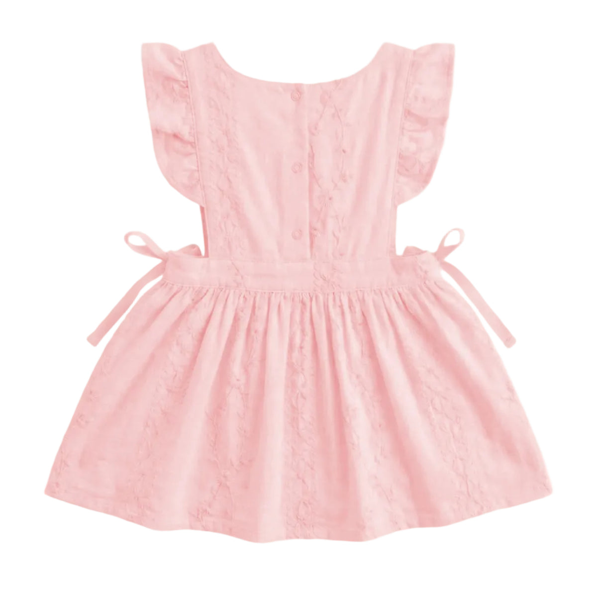 A light pink baby dress with ruffled cap sleeves, a buttoned back, and side ties, shown against a plain light gray background.
