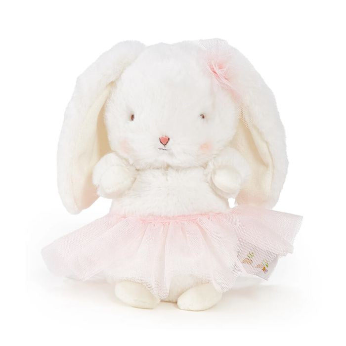 White plush bunny with a pink skirt on a white background