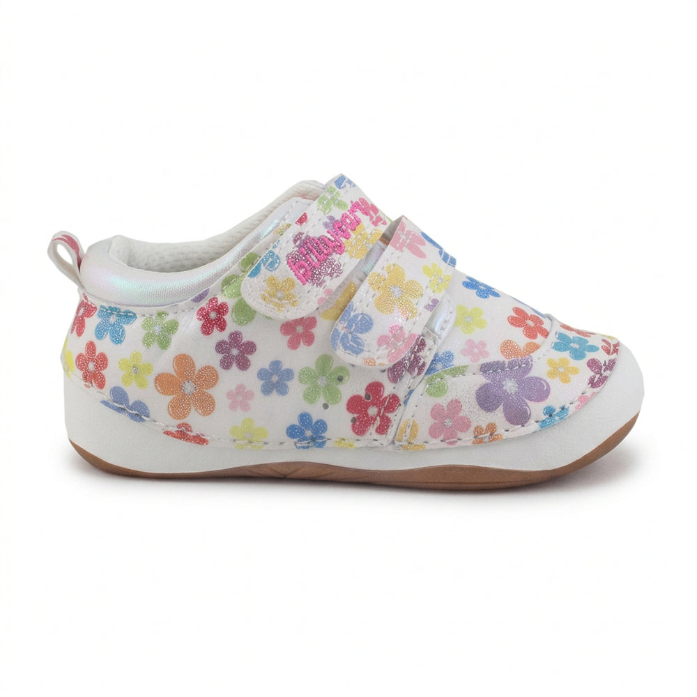 White shoe with colorful floral pattern on a white background