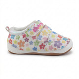 White shoe with colorful floral pattern on a white background