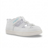 A white toddler girl's sandal with a flexible non-slip rubber sole, an ergonomic design, and protective closed toes. It features a wide foot opening and a soft padded lining.