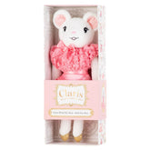 A plush toy named Claris, with a pink dress, white body, and gold shoes, packaged in a branded pink and white gift box.