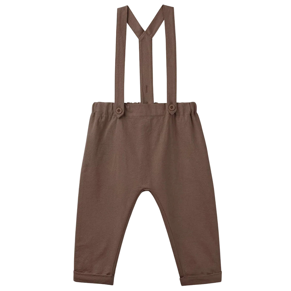 Brown children's overalls with suspenders on a light gray background