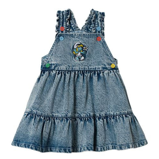 Blue denim dress with ruffled details with a smurfette image on the bodice on a white background