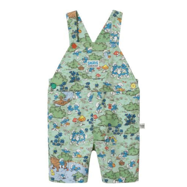 Children's overalls in smurf print with a colorful pattern on a white background