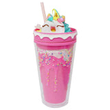 Pink tumbler with unicorn design and straw on a white background