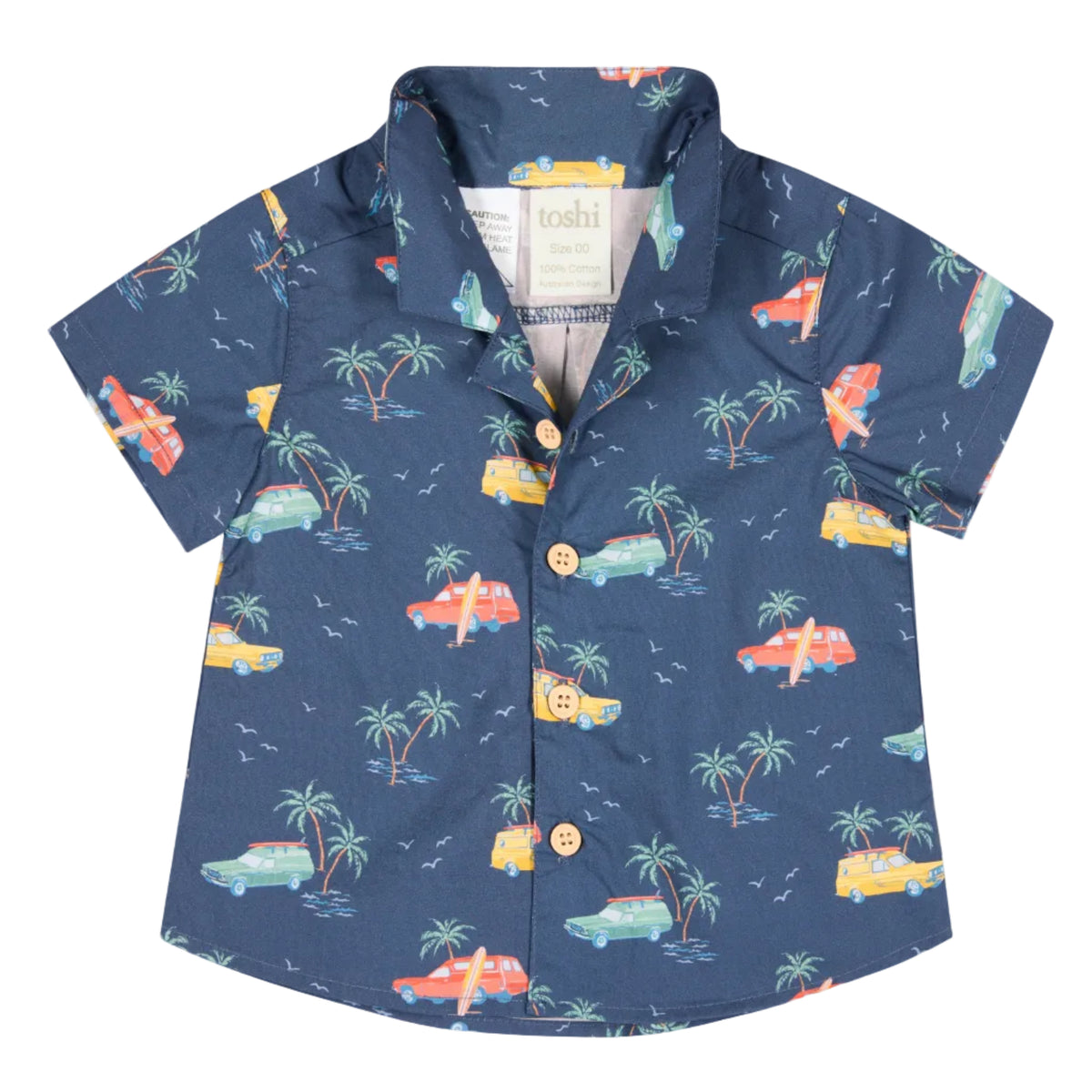 Children's navy buttoned shirt with colorful car and palm tree pattern on a white background