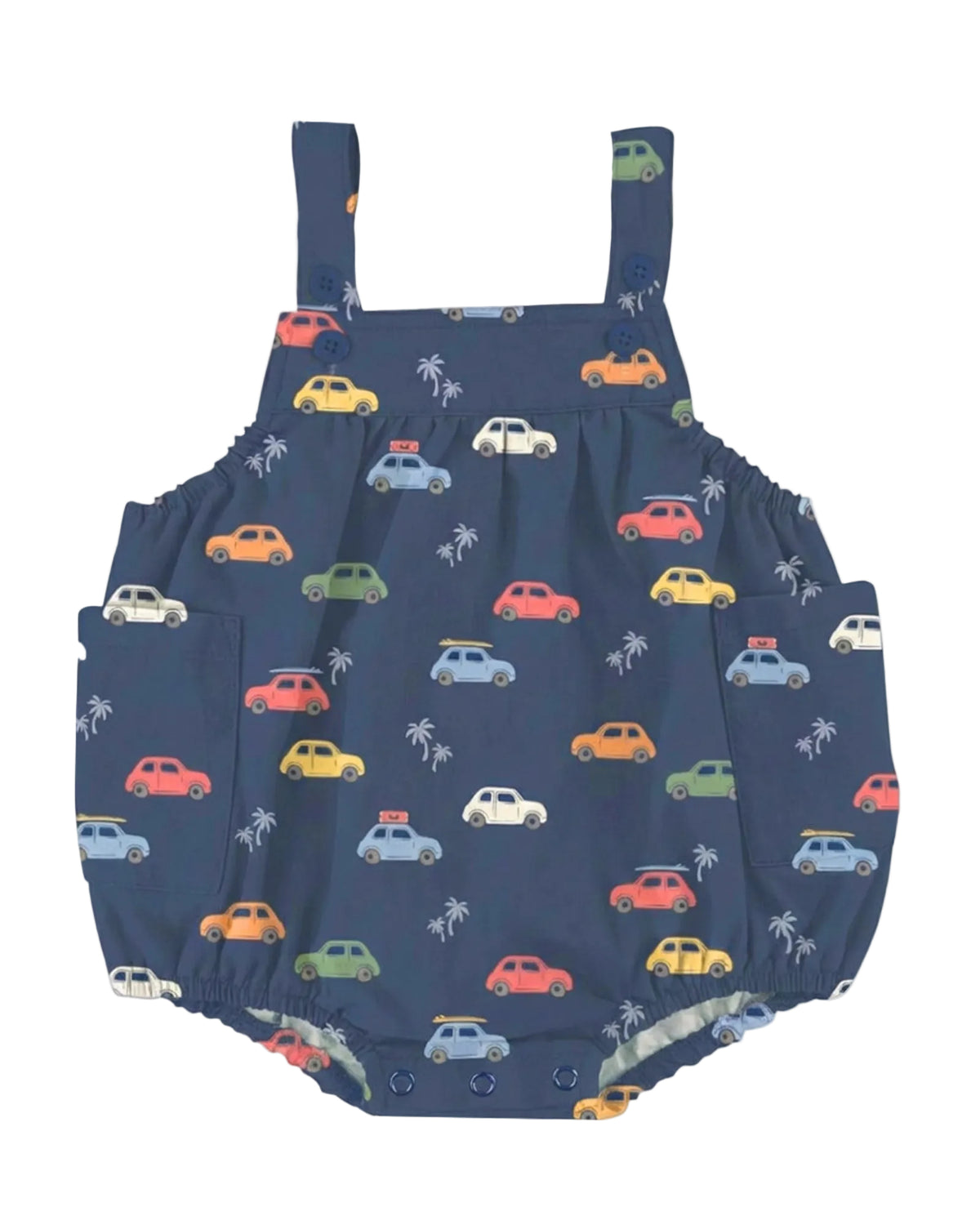 A navy blue baby romper with an all-over print of colorful cars and palm trees, featuring shoulder straps and side pockets, shown against a light gray background.
