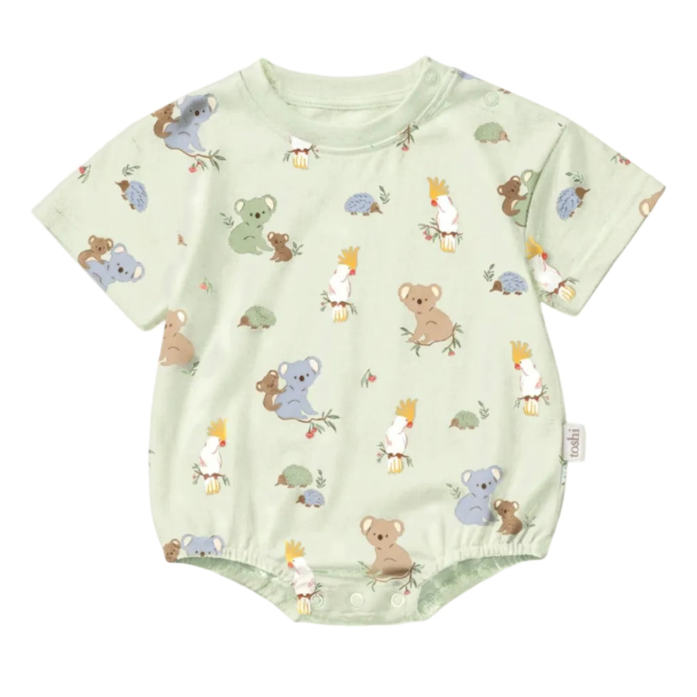 A baby short-sleeve bodysuit in pale sage green with an all-over cartoon animal print, including koalas, kangaroos, and a cockatoo, shown on a white background.