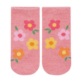 Pair of pink socks with floral designs on a light gray background