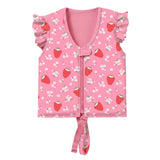 Pink children's zip-front vest with ruffled cap sleeves, a strawberry and white floral print, and a tie detail at the front hem, shown on a light gray background.