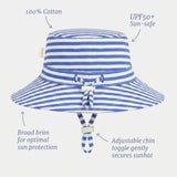Blue and white striped cotton sun hat with a wide brim, chin tie, and text callouts highlighting features like UPF50+ sun protection and adjustable chin toggle.