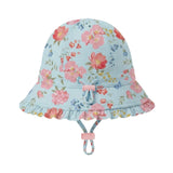 A light blue bucket hat with a pink and red floral pattern, featuring a ruffled brim, a small pink bow, and a matching chin strap, shown against a neutral gray background.