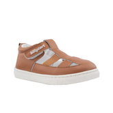 Tan unisex toddler sandal with a Velcro strap, wide foot opening, and ergonomic foot pads in the sole.