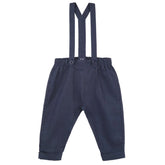 Navy linen suspender pants with adjustable straps and matching suspenders, featuring front buttons.