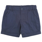 Navy Finley Linen shorts for boys with an adjustable elasticized waist and front zipper and button.