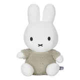 A medium-sized plush toy of Miffy with a fluffy texture, dressed in a green outfit, designed for cuddling and play.