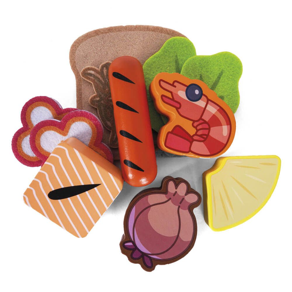 Colorful Bluey set of toy food items including bread, carrot, shrimp, and others on a white background