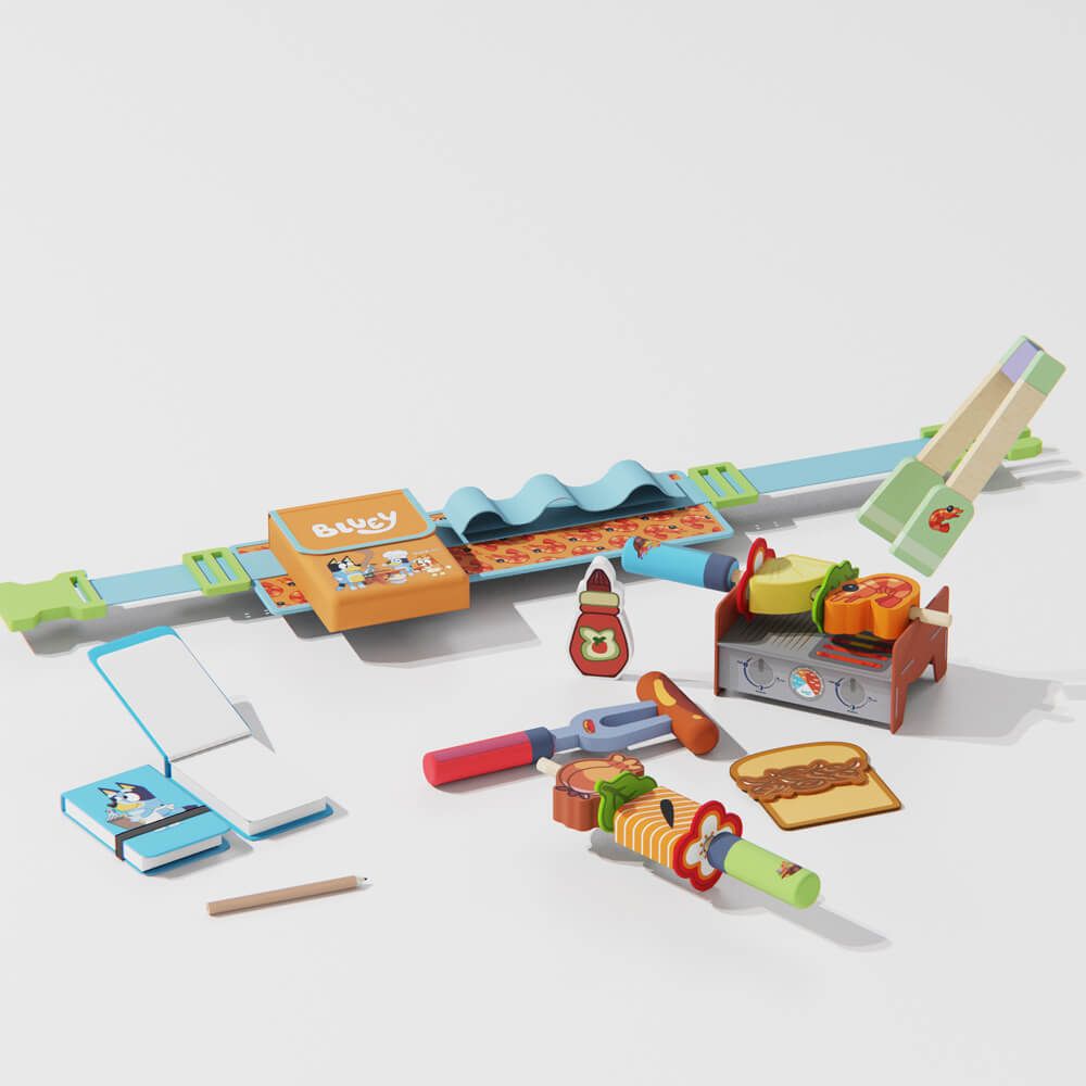 Bluey Toy set with a grill, skewers, and other accessories on a white background