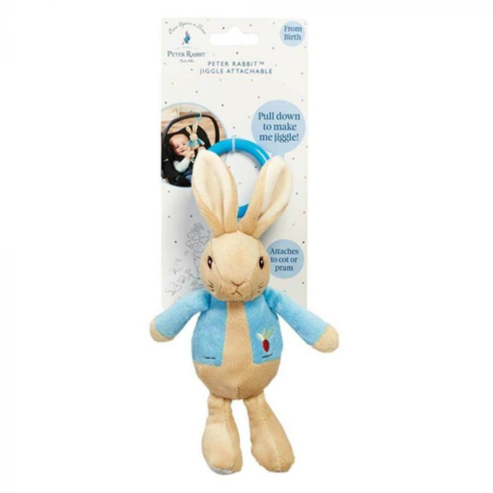 A Peter Rabbit jiggler toy designed for babies, showing the toy in a standing position with a label at the top.