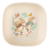 A square bowl with an illustration of Peter Rabbit and Benjamin Bunny surrounded by foliage.