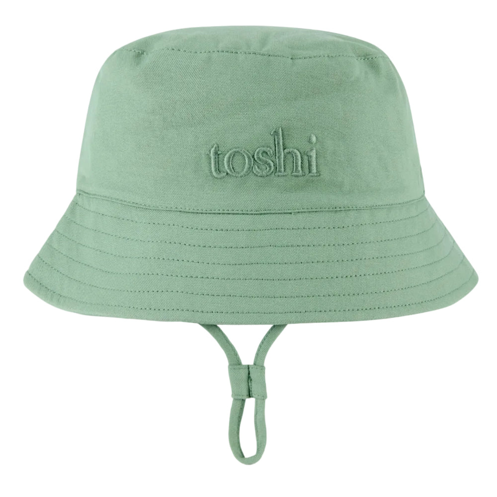 Green bucket hat with 'toshi' branding on a white background