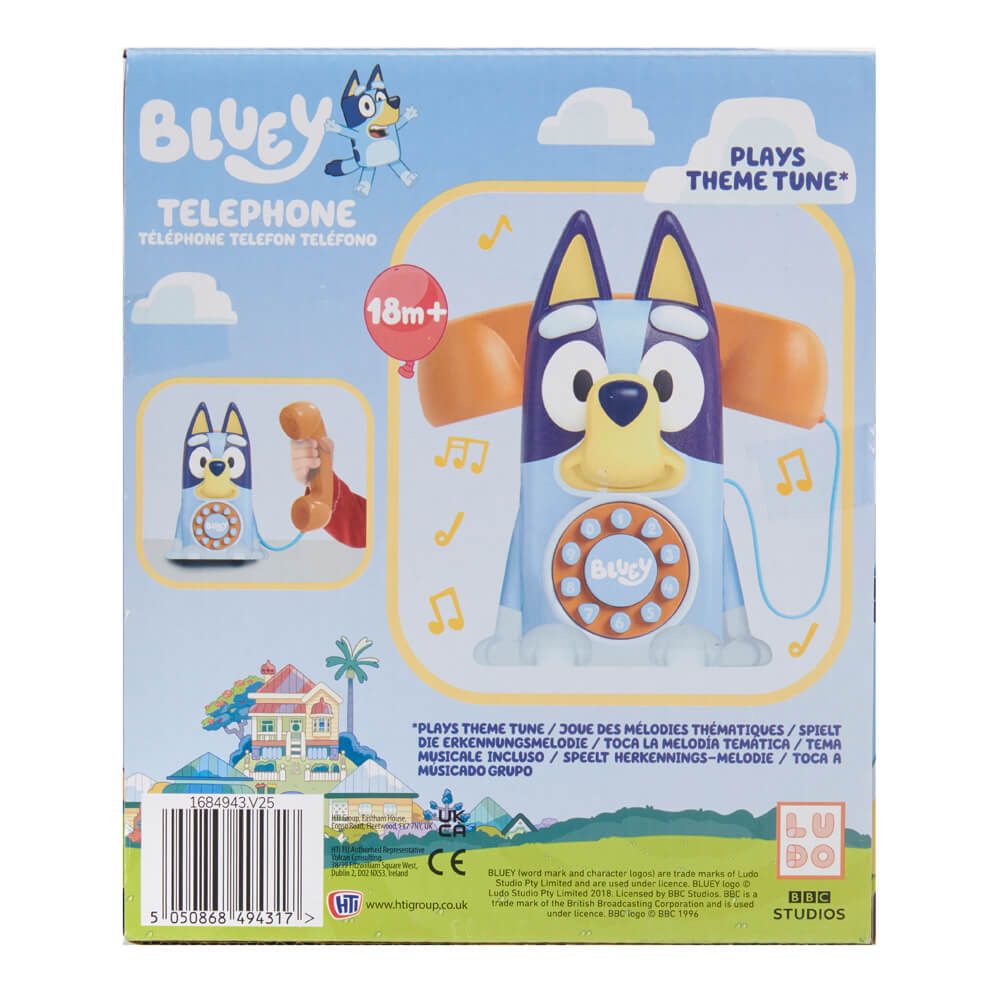 Bluey Telephone toy packaging on a white background, showing the product box front with a cartoon Bluey character, a telephone, and multilingual text including 'Plays Theme Tune' and '18m+'.