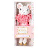 A plush toy named Claris, with a pink dress, white body, and gold shoes, packaged in a branded pink and white gift box.