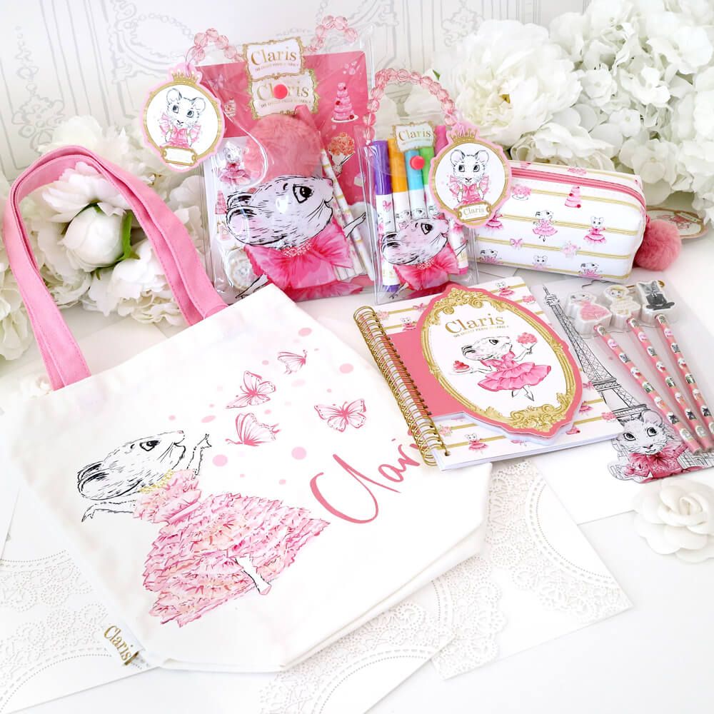 Claris tote bag with a selection of claris stationary surrounding it