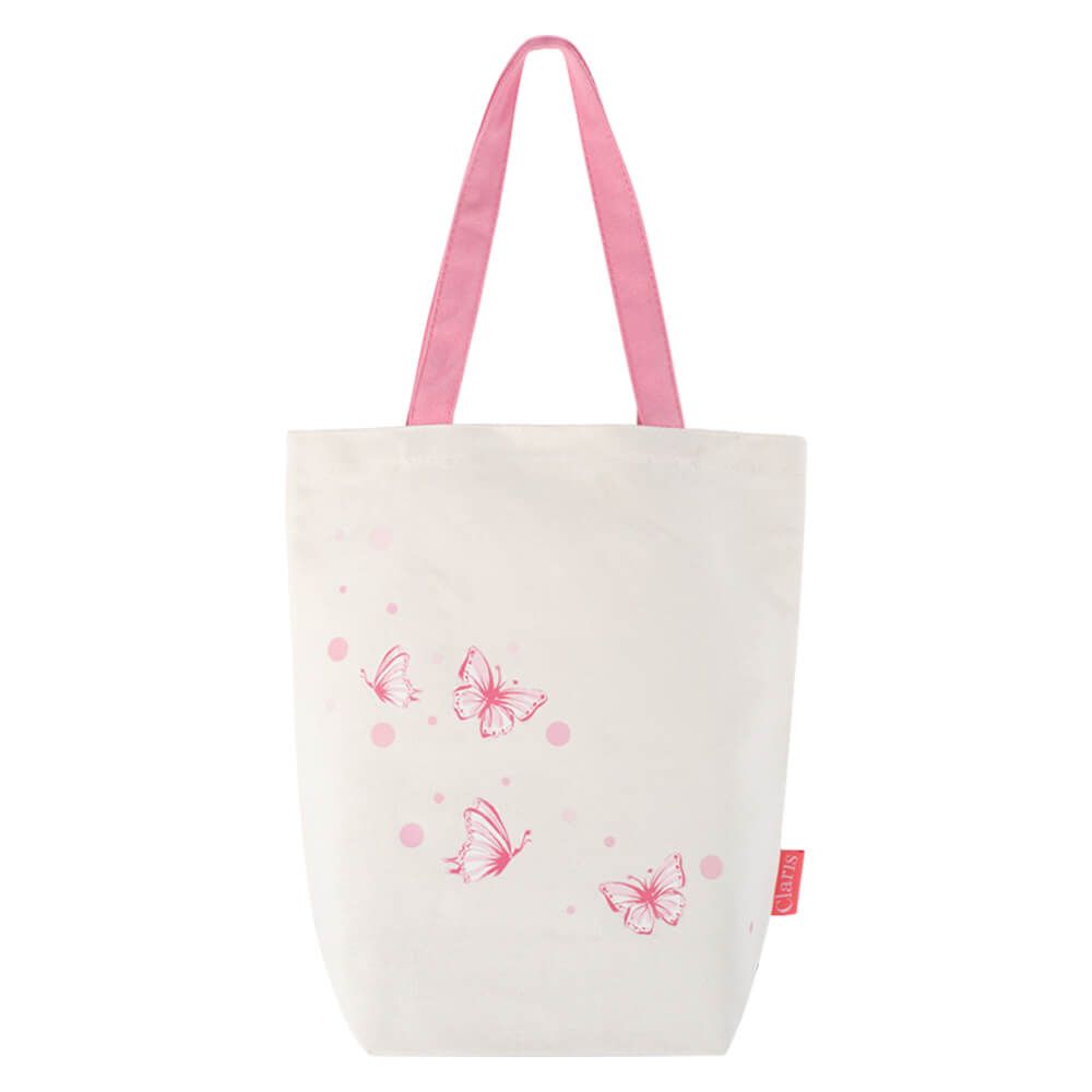 Claris tote bag back with pink butterflies on it and a pink handle with ivory background