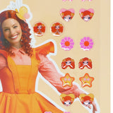 Emma Memma wears an orange dress surrounded by various character stickers on a beige background