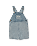 Blue denim overalls on a white background