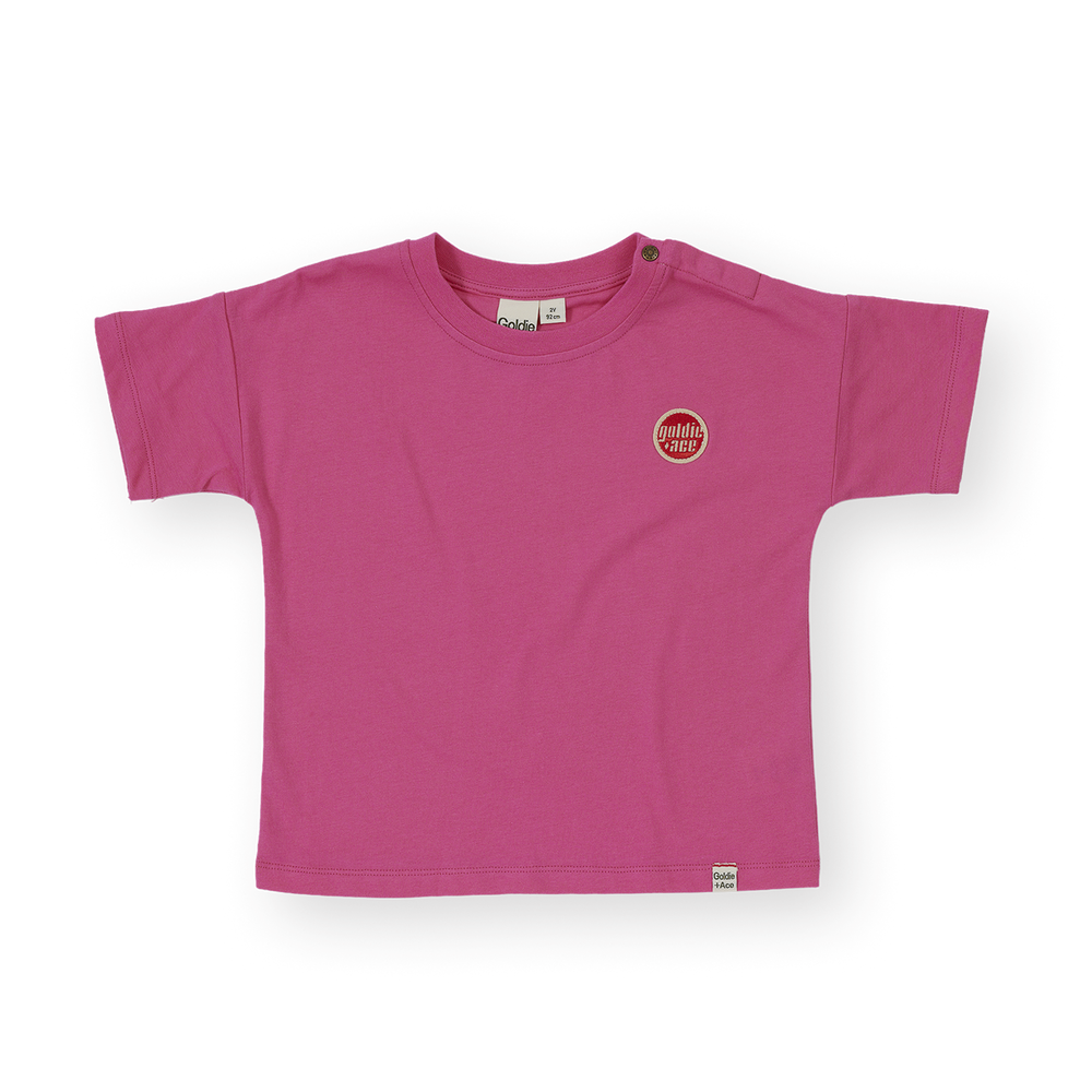 Pink t-shirt with a logo on a white background
