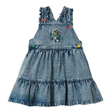Blue denim dress with ruffled details with a smurfette image on the bodice on a white background