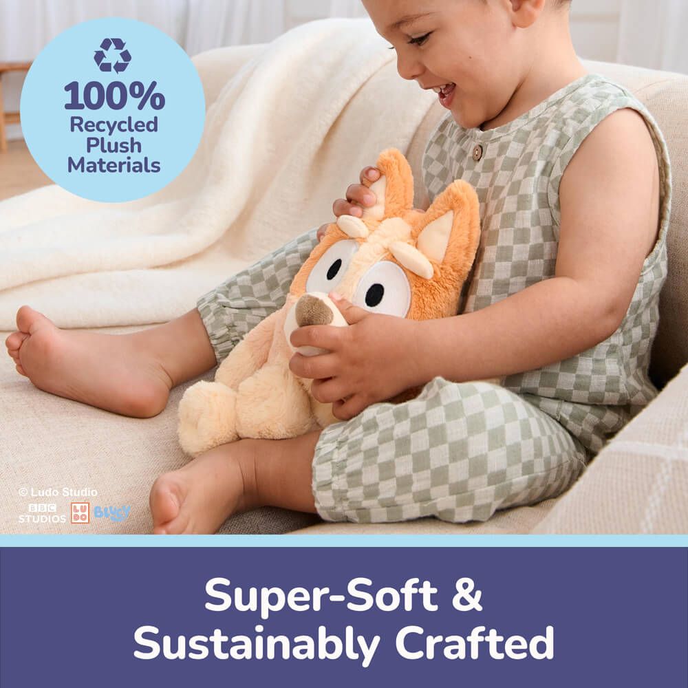 Child holding a plush toy with '100% Recycled Plush Materials' label and text 'Super-Soft &amp; Sustainably Crafted'.
