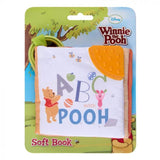 Winnie the Pooh soft book with ABC text on a colorful packaging