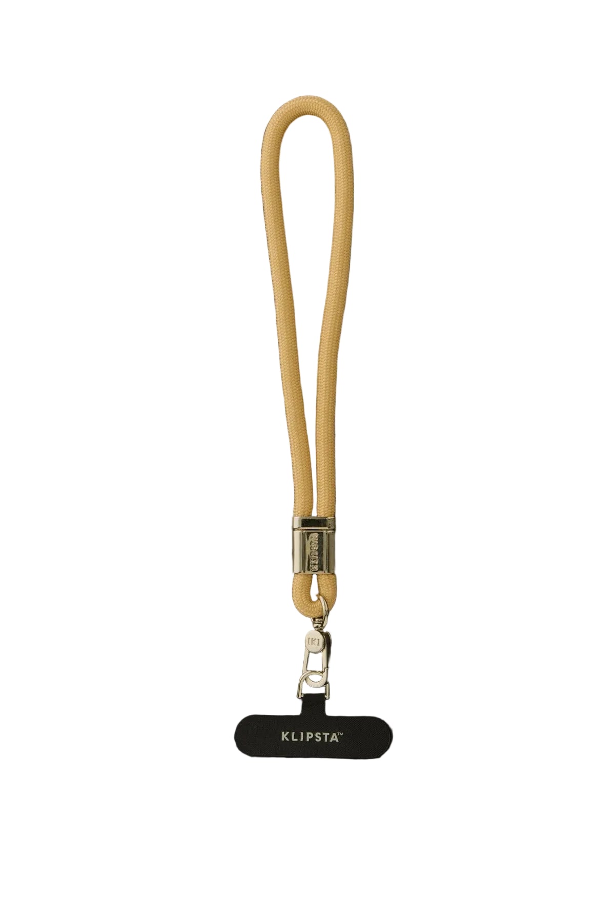 A beige leather wrist strap with a silver metal clasp and a black KLIPSTA tag hanging below, displayed on a dark background.
