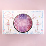 Bead kit packaging with pink and purple beads on a pink background, featuring the brand 'lauren hinkley'.