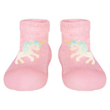 A pair of pink organic hybrid walking socks with a unicorn design and skid resistant rubber soles for babies.