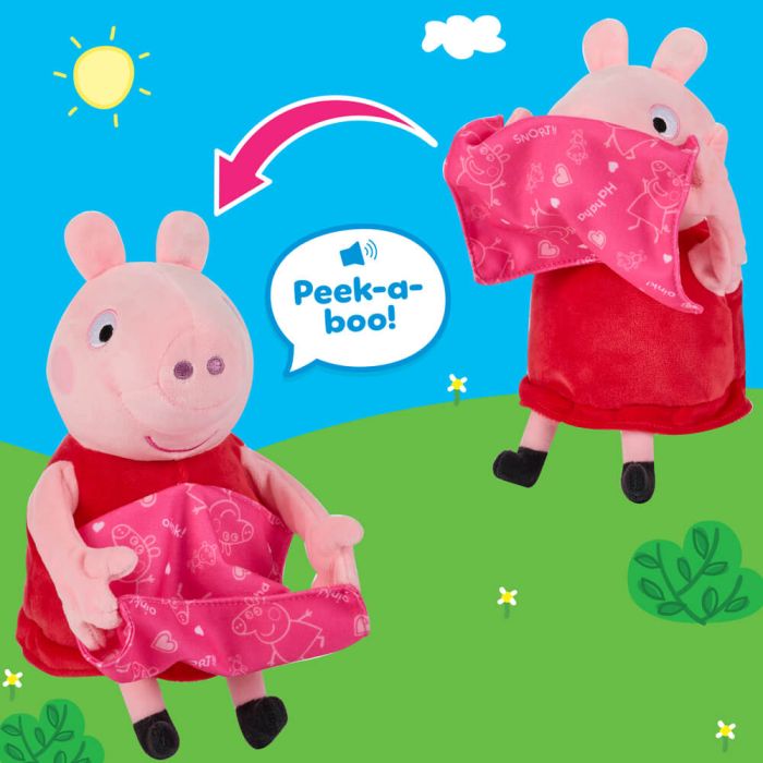 A Peppa Pig peek-a-boo toy set shown on a bright blue sky and green grass background. The image includes a plush pig figure in a red dress holding a pink patterned cloth, plus a floating view of the same toy from the back showing a red dress and matching pink cloth.