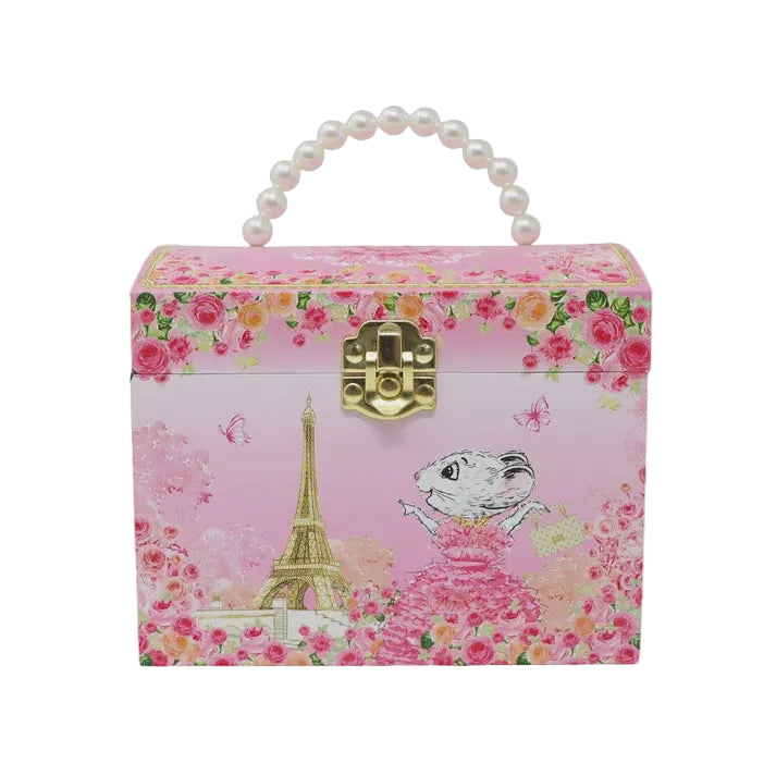 A pink decorative storage box with a pearl handle and gold clasp, decorated with floral patterns, the Eiffel Tower, butterflies, and a cartoon mouse in a pink dress.