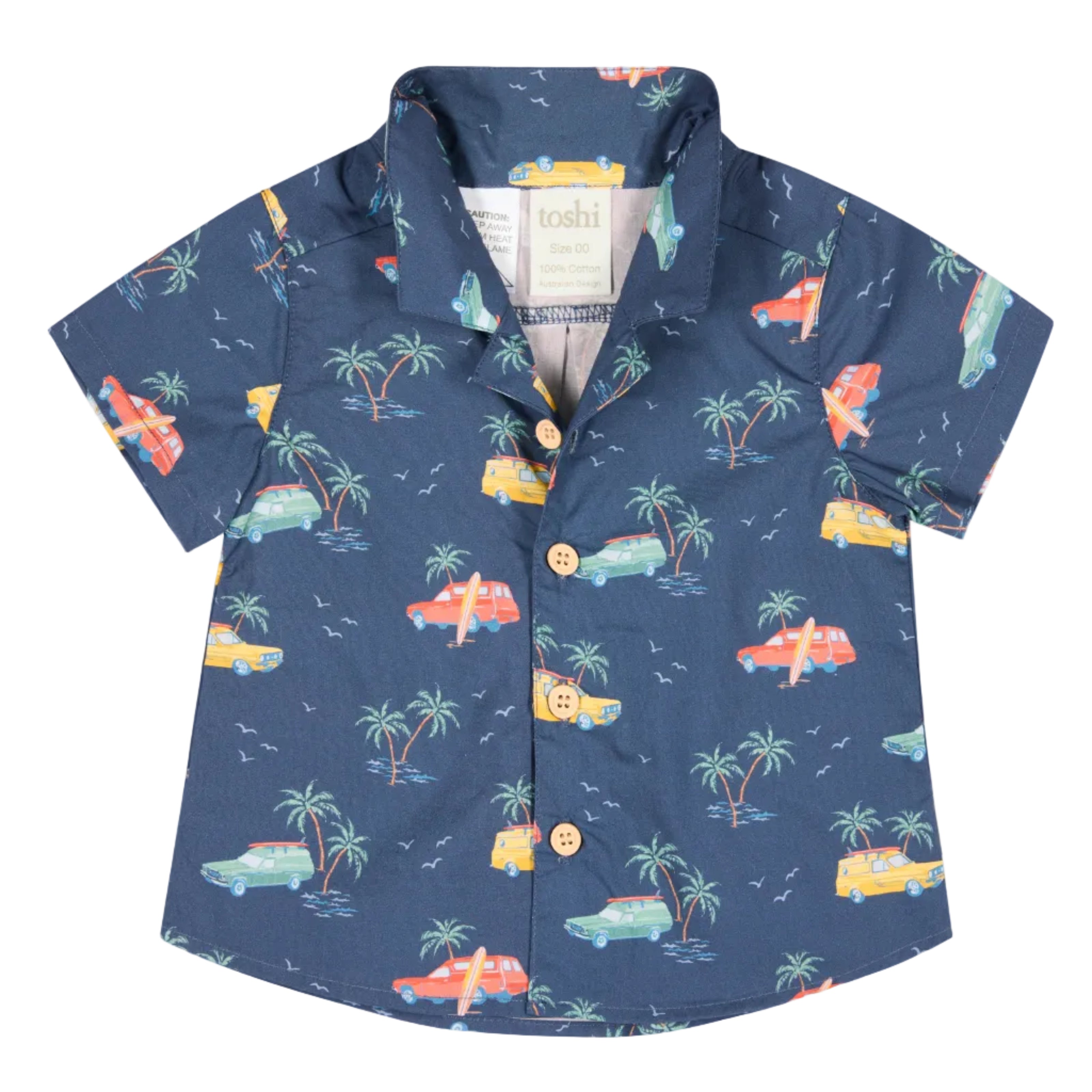 Children's navy buttoned shirt with colorful car and palm tree pattern on a white background