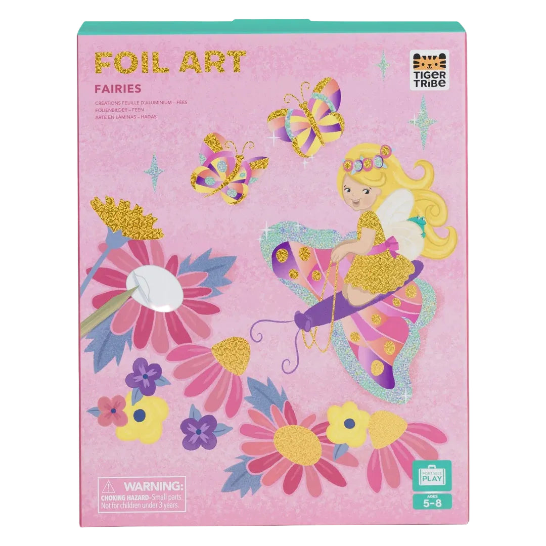 Tiger Tribe Foil Art Fairies kit box, featuring a pink background with glittery gold foil text, colorful fairy illustrations, butterflies, and flowers.