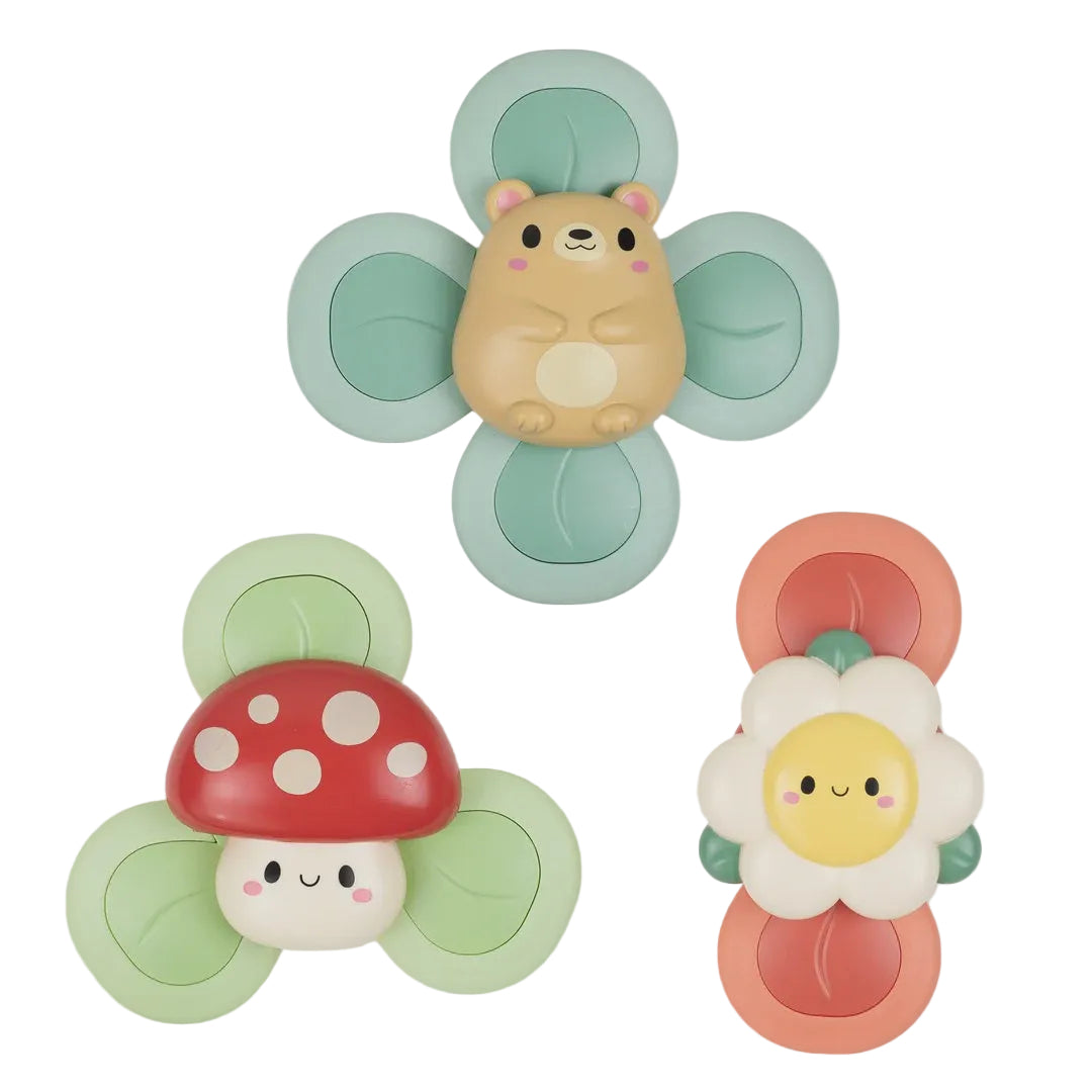 Set of colorful children's toy spinners shaped like a mushroom, flower, and animal on a white background