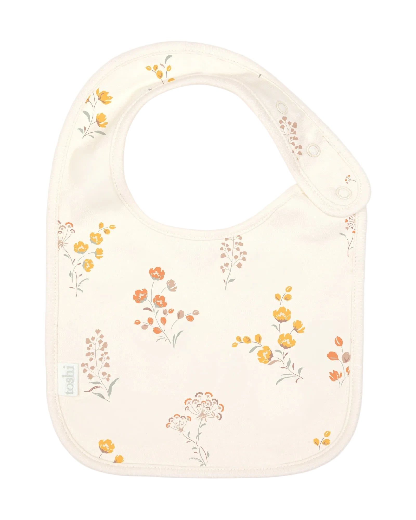 Baby bib cream with floral pattern on a lwhite background
