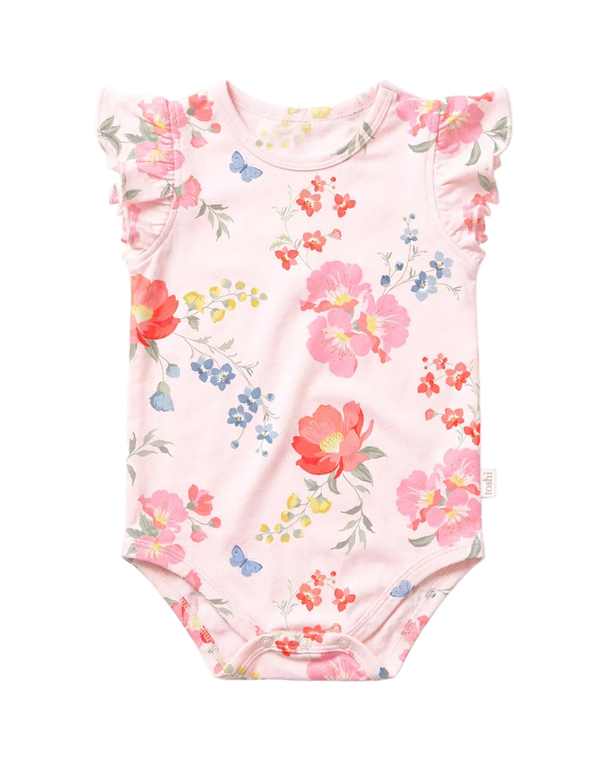 A baby bodysuit in light pink with a watercolor floral print featuring red, pink, blue, and yellow flowers, green leaves, and small blue butterflies. It has ruffled cap sleeves and a snap closure at the bottom.
