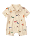 A baby short-sleeve romper in cream with a colorful animal and vehicle print, featuring a polo collar and snap closures.