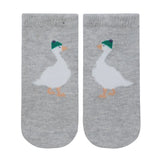 Pair of gray socks with duck design on a light gray background